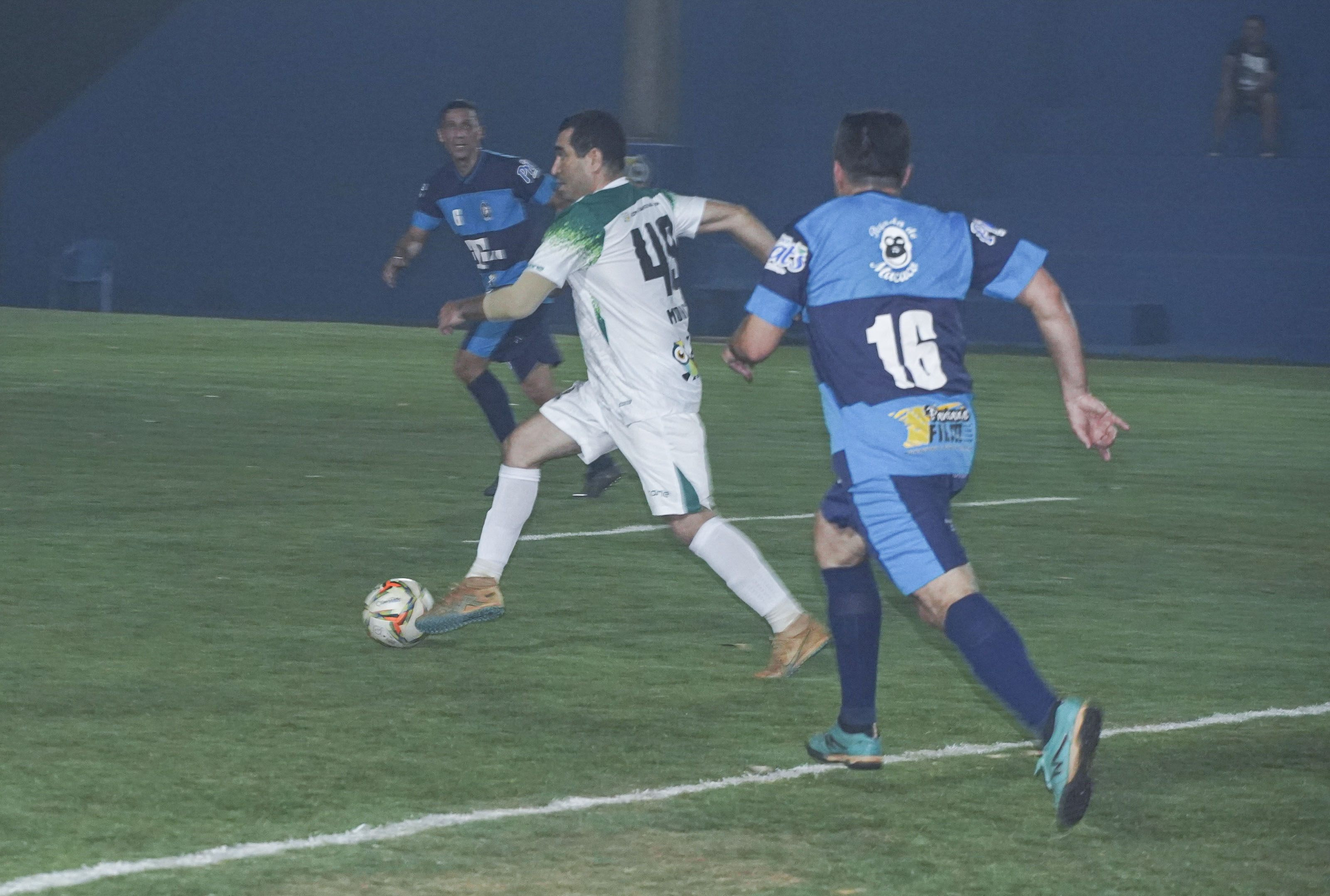 a group of men playing football