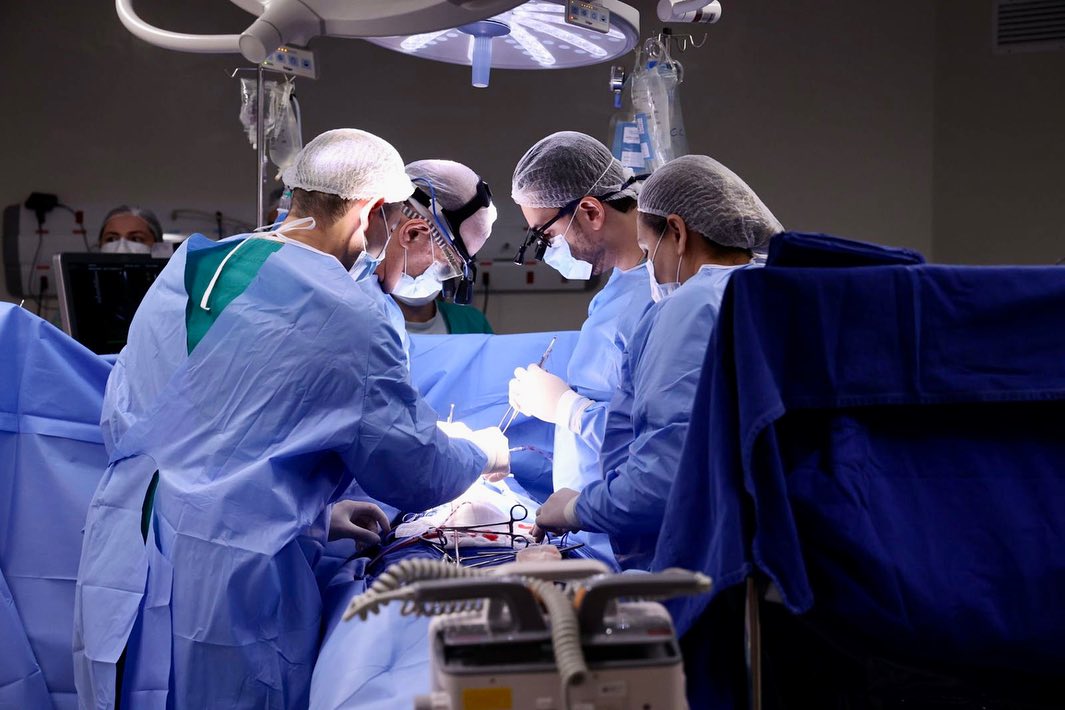 a group of surgeons performing surgery